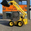 Miniîncărcător Komatsu SK815 – 3000 kg -Cupa multifunctionala