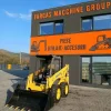 Miniîncărcător Komatsu SK815 – 3000 kg -Cupa multifunctionala