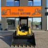 Miniîncărcător Komatsu SK815 – 3000 kg -Cupa multifunctionala