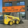 Miniîncărcător Komatsu SK815 – 3000 kg -Cupa multifunctionala